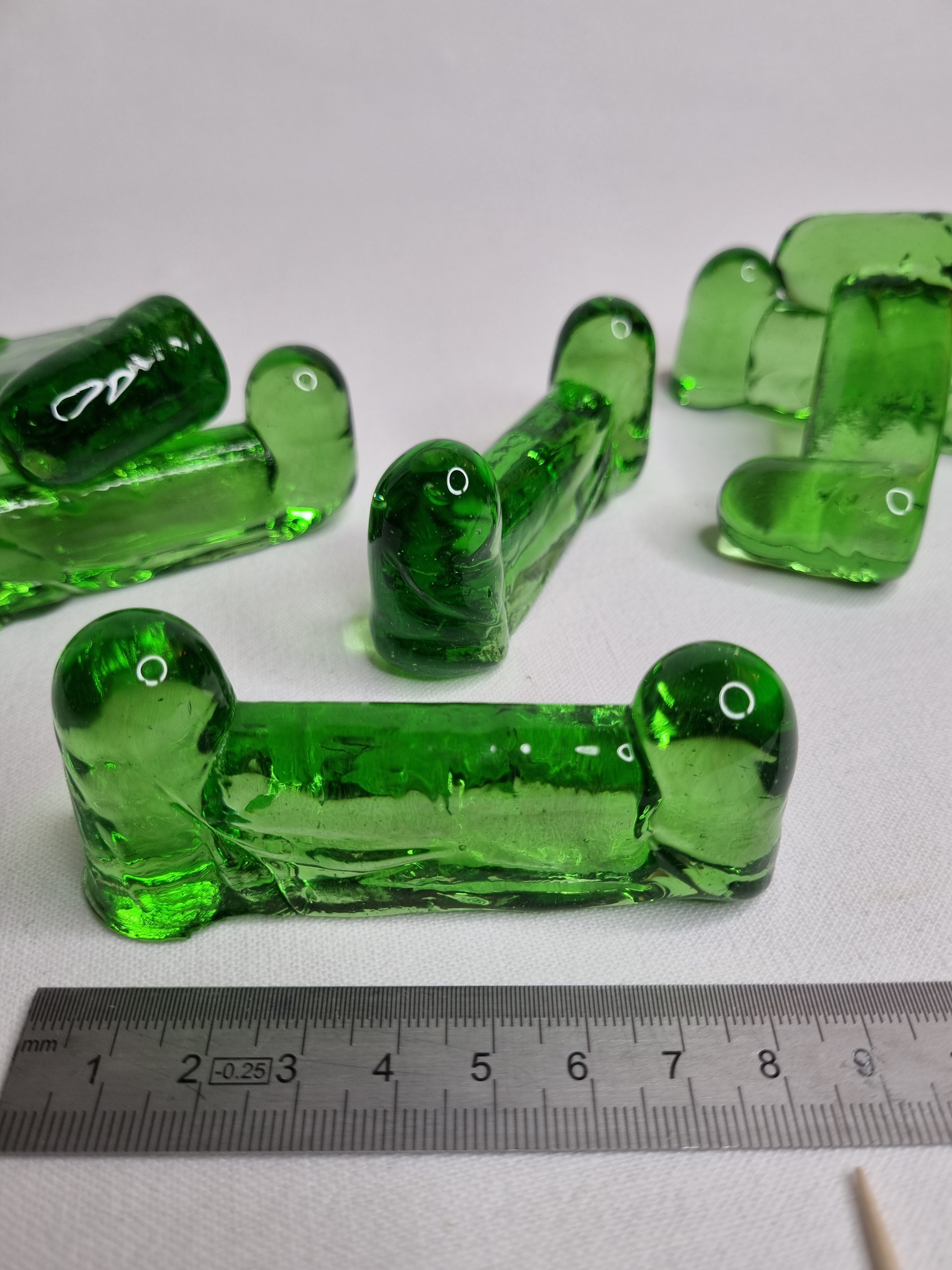 Set of six emerald glass knife holders signed Biot