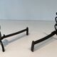 Pair of Brass and Wrought Iron Chenets with Triple Volute and Mount Torch Holders