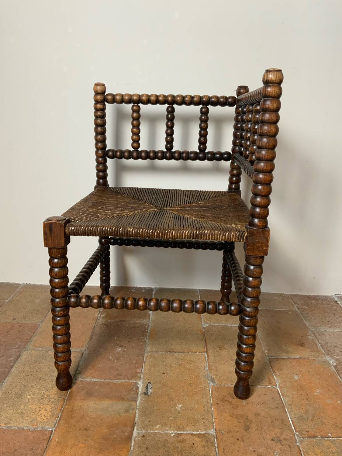 Chaise d’angle perlée