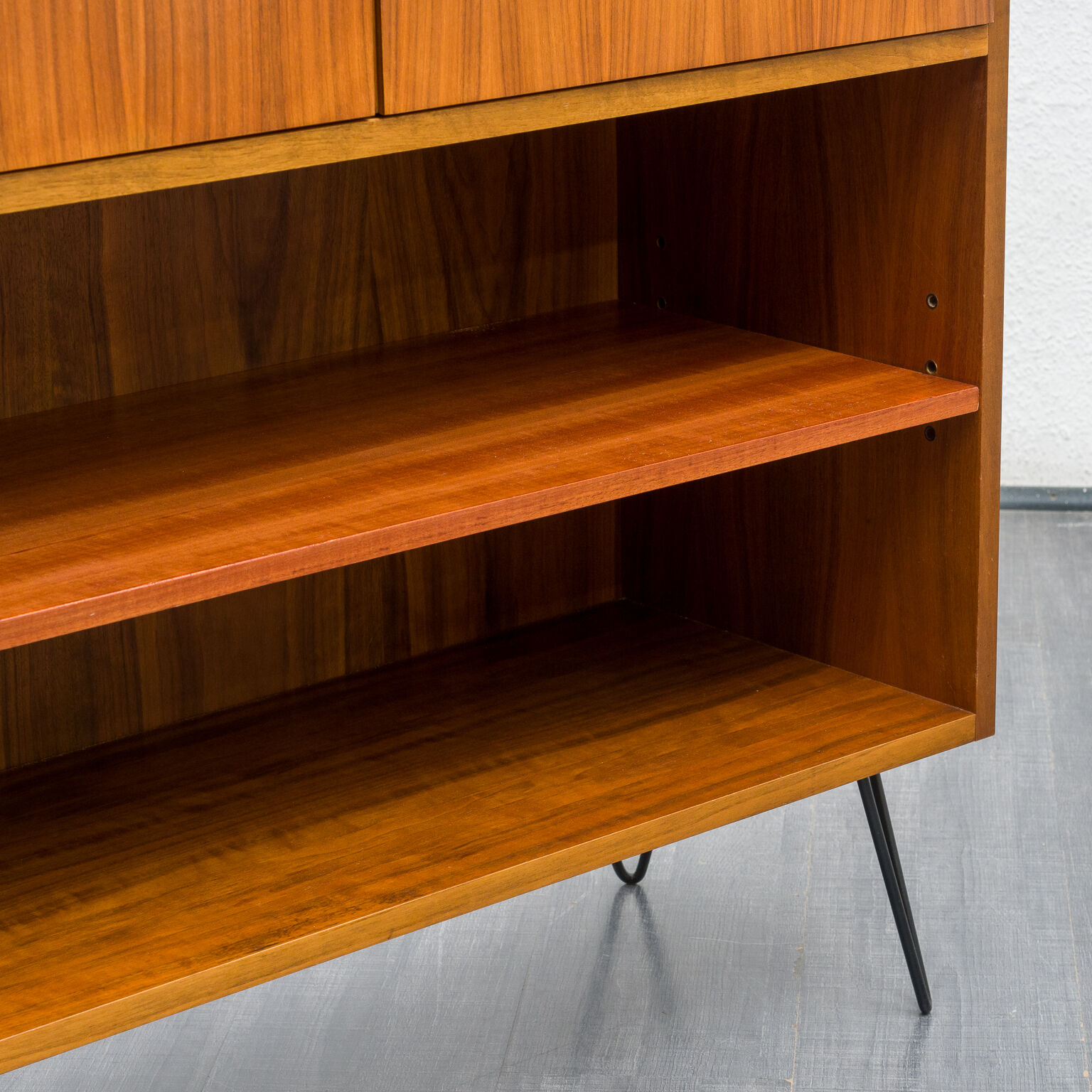 High walnut wood row, metal legs