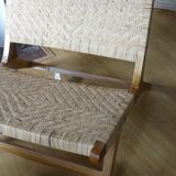 Teak and natural rattan armchair