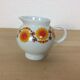 Orange flower tea service, porcelain, 7 cups 1970