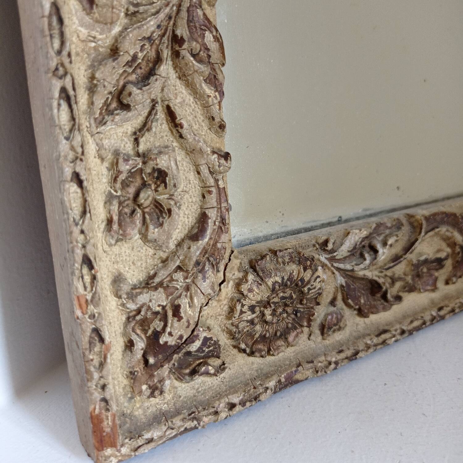 Wood and patinated stucco mirror