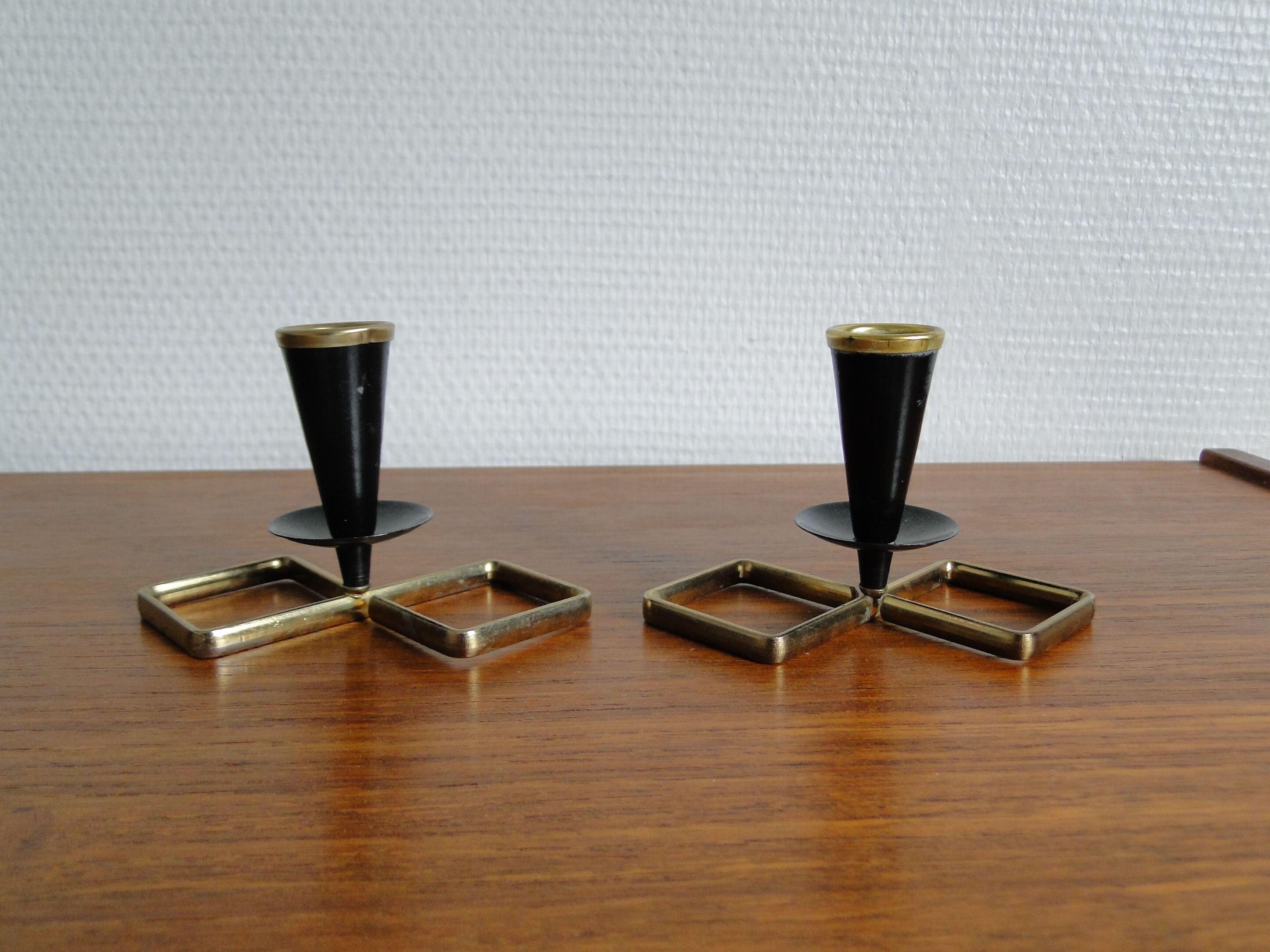 Pair of vintage candle holders in black metal and brass Sweden 1960