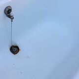 Cast iron bathtub on legs