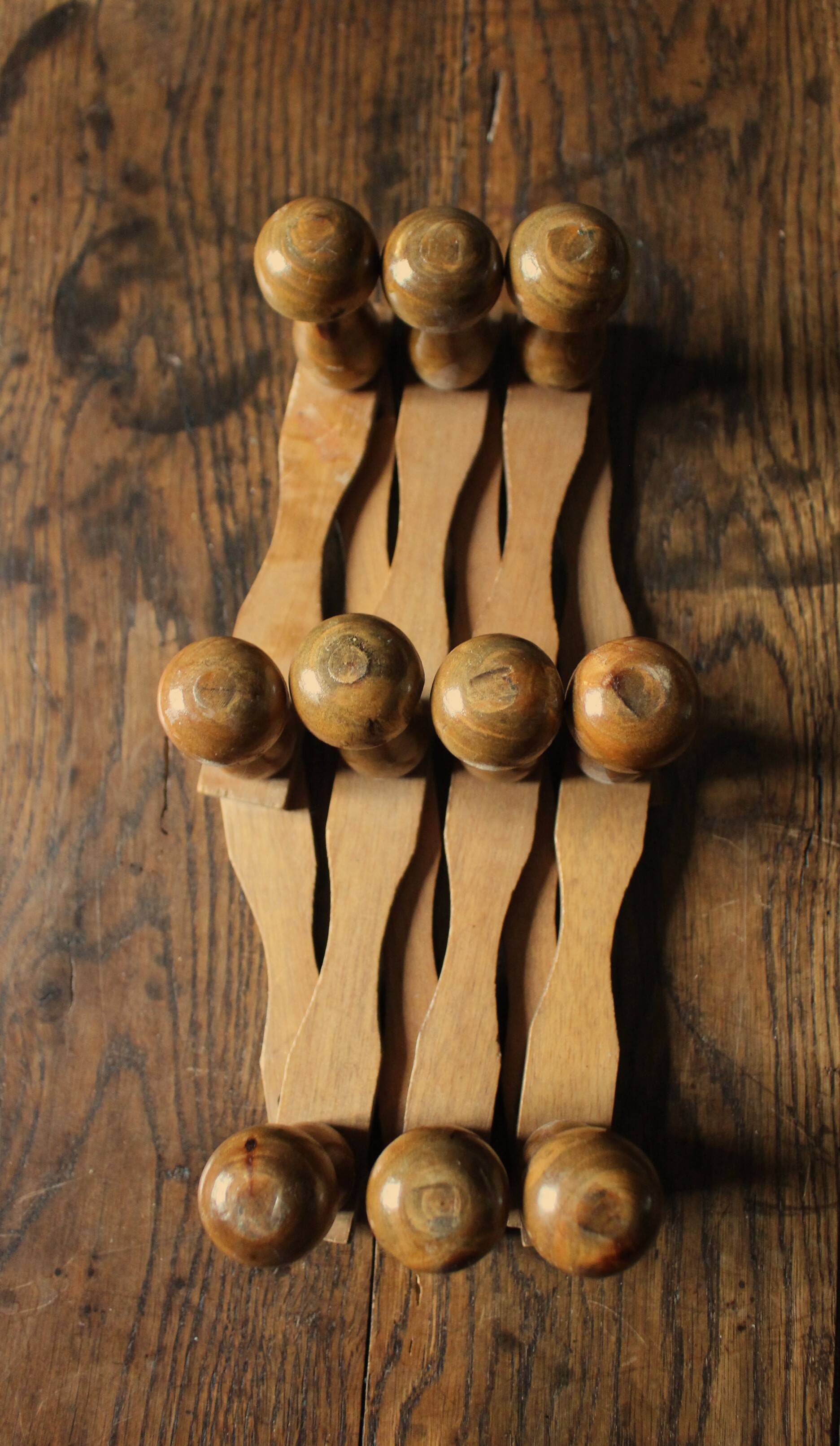 Vintage wooden ball accordion coat rack