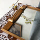 Metal, wood and mirror top