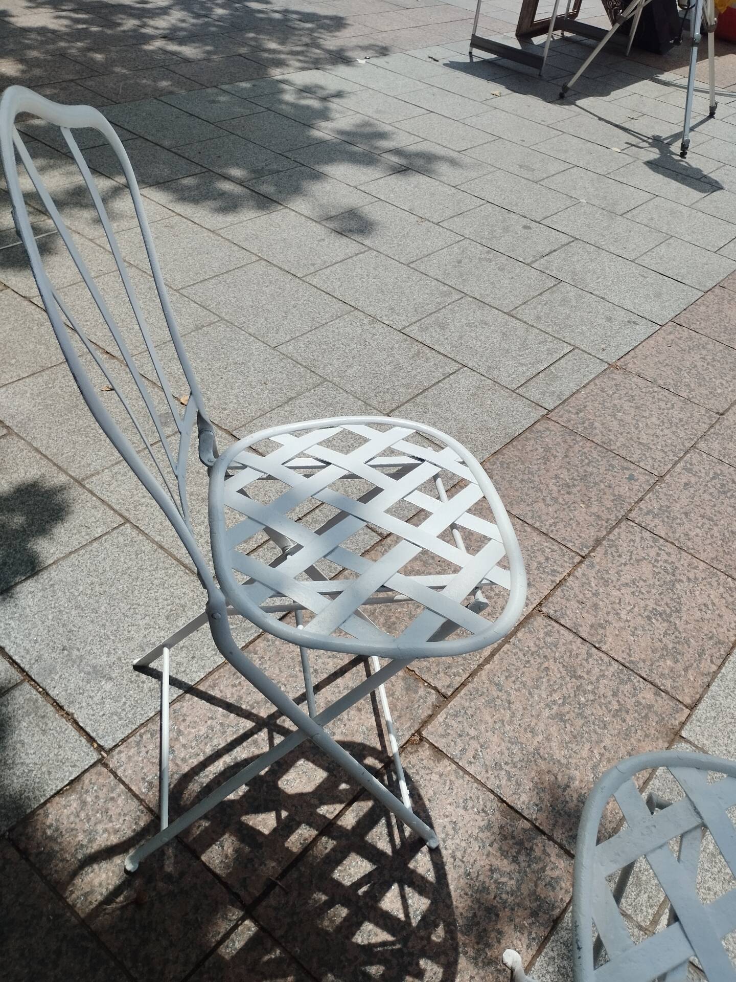 Antique garden furniture in solid wrought iron.