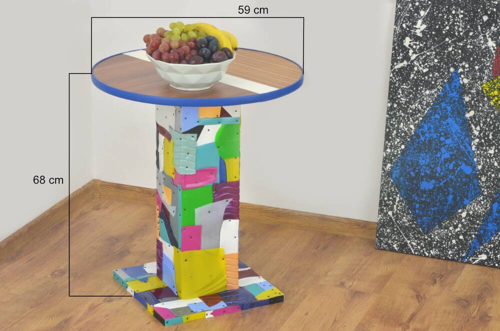 Handmade table made from recycled materials, colourful, abstract.