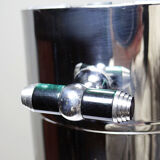 Vintage champagne bucket from the 80s-90s by Orfévrerie Jean Couzon in 18/10 stainless steel.