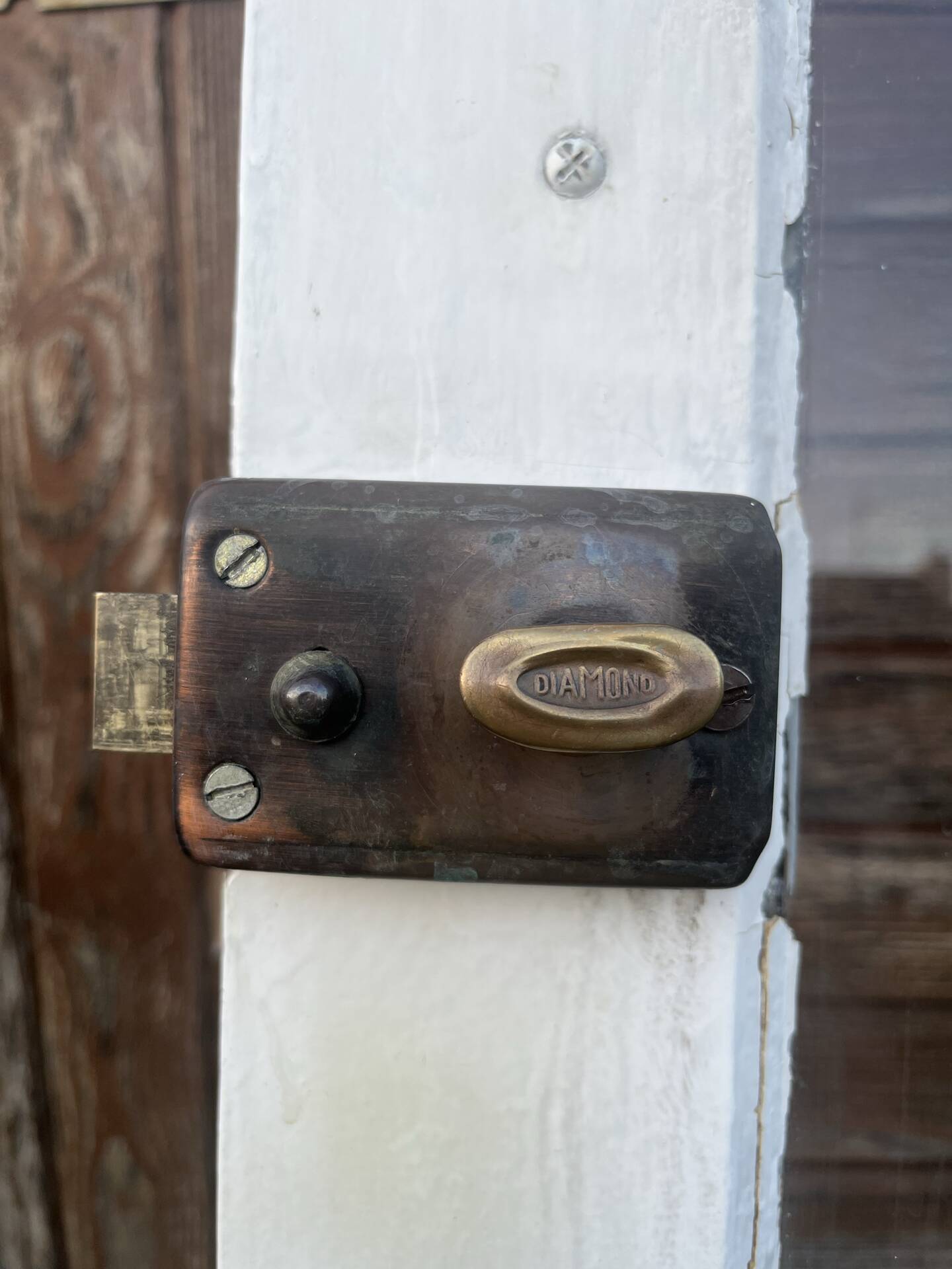 Porte d'entrée ancienne semi-vitrée en bois