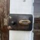 Porte d'entrée ancienne semi-vitrée en bois