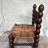 Turned wooden chair by Charles Dudouyt