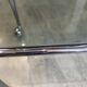 Vintage 1950s silver metal bar cart with wheels and two glass shelves