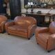 Ensemble 2 fauteuils club en simili cuir camel 1980’s