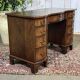 English desk from the 1950s in mahogany with a leather top.