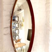 Oval hall mirror, wooden frame. Scandinavia 1960s 33x100cm