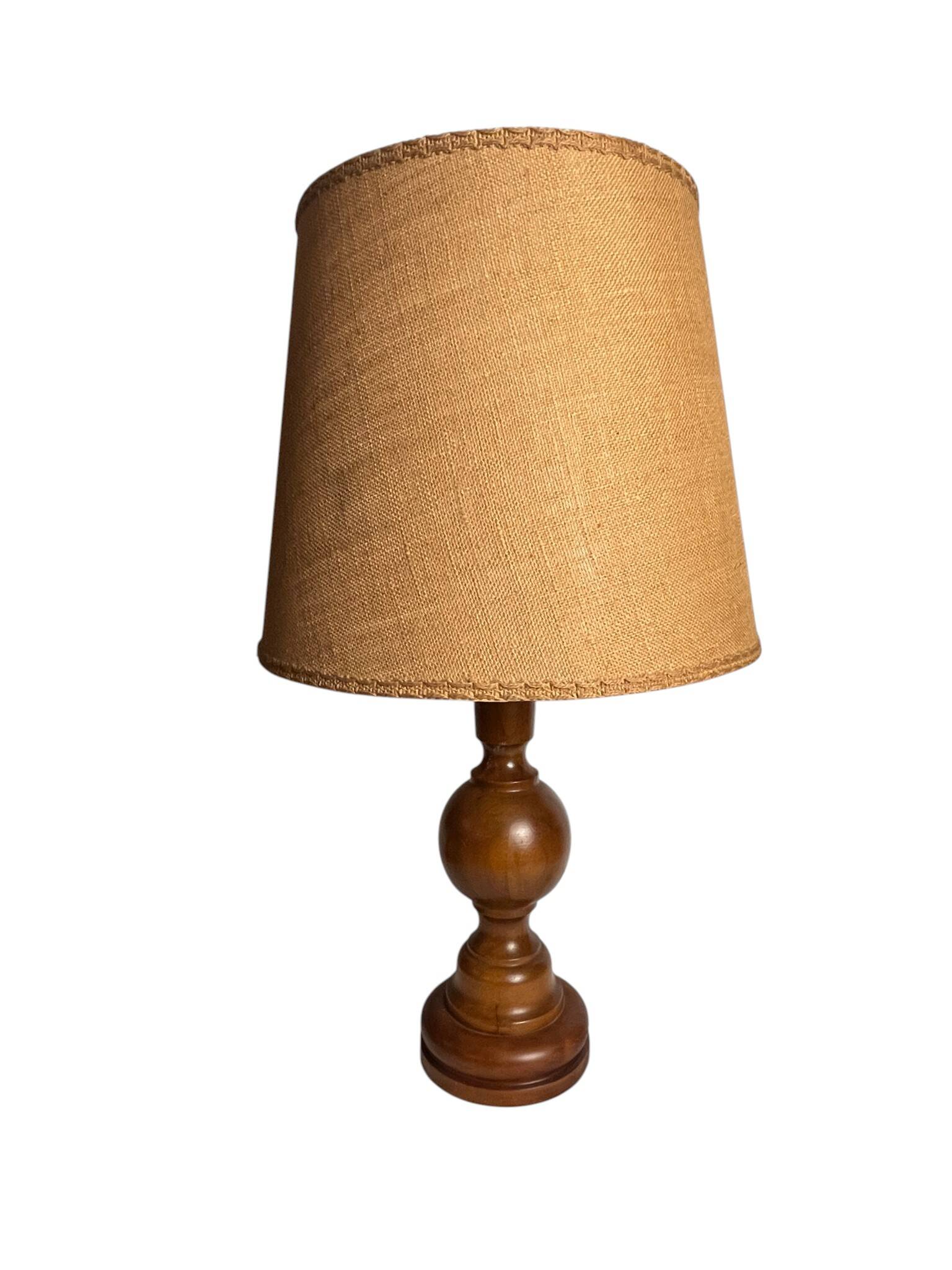 Vintage, large wooden base lamp with shade from around 1970.