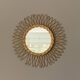 Sun mirror in woven rattan. 50cm. 1960.