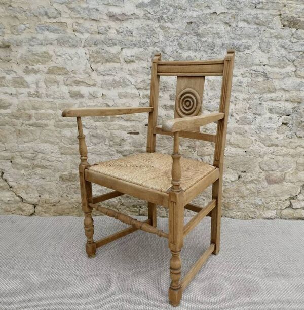 Fauteuil néo basque en bois clair et assise cannée