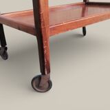 Art Deco wooden serving trolley on wheels.