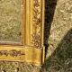 Grand miroir ancien doré à la feuille