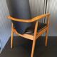 A Scandinavian teak skai chair from the 1960s for a vintage desk table.