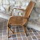 Rattan armchair and his feet rest