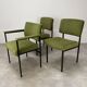 2 chairs and 1 office armchair from the 1950s in green velvet and black metal.