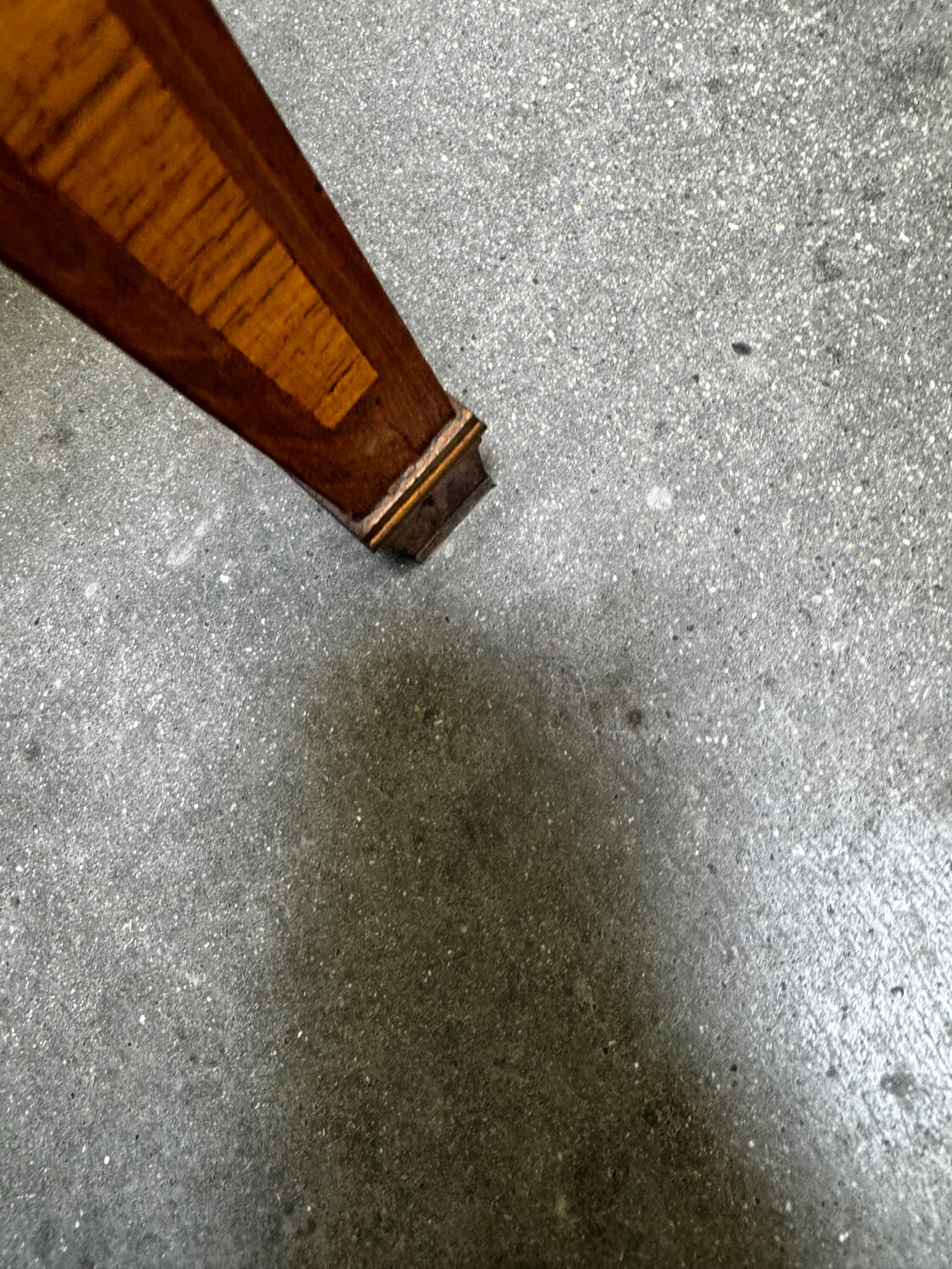 Cylinder desk with marquetry featuring a crosshatch design.