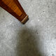 Cylinder desk with marquetry featuring a crosshatch design.
