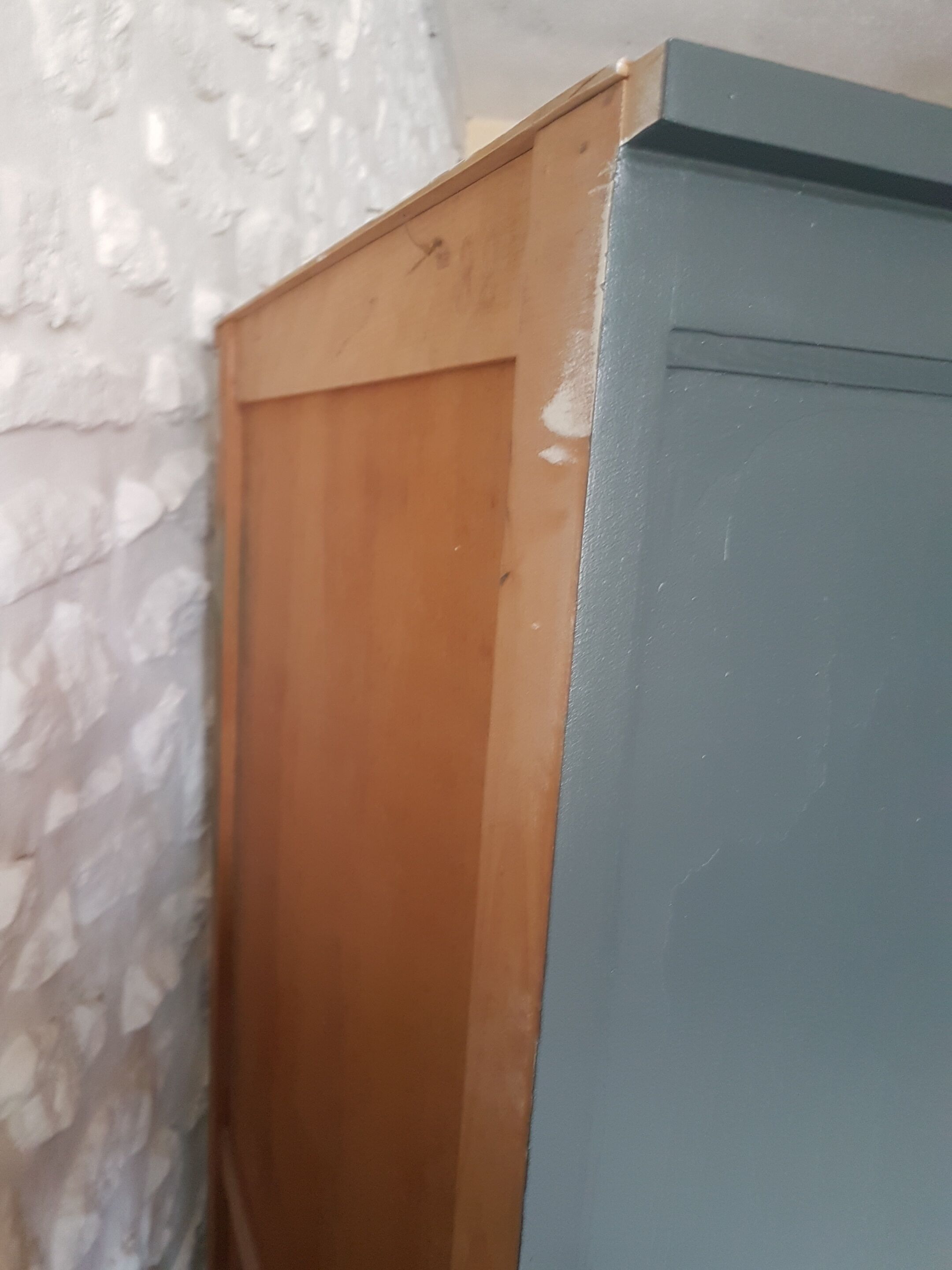 Vintage wooden wardrobe in deep blue