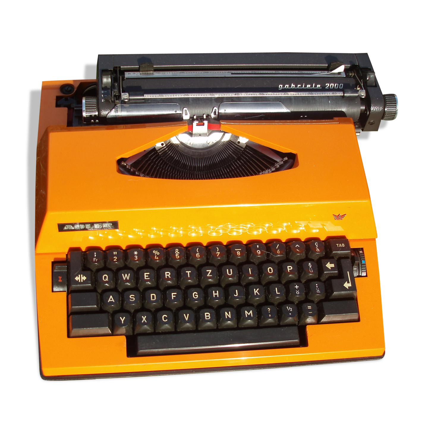 Electric writing machine adler orange and black with its suitcase