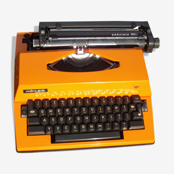 Machine a ecrire  electrique adler  orange et noire avec sa valise