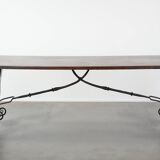 Antique 18th-century Spanish dining table with a wrought iron base