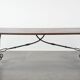 Antique 18th-century Spanish dining table with a wrought iron base