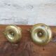 Old pair of brass candlesticks cellar rats