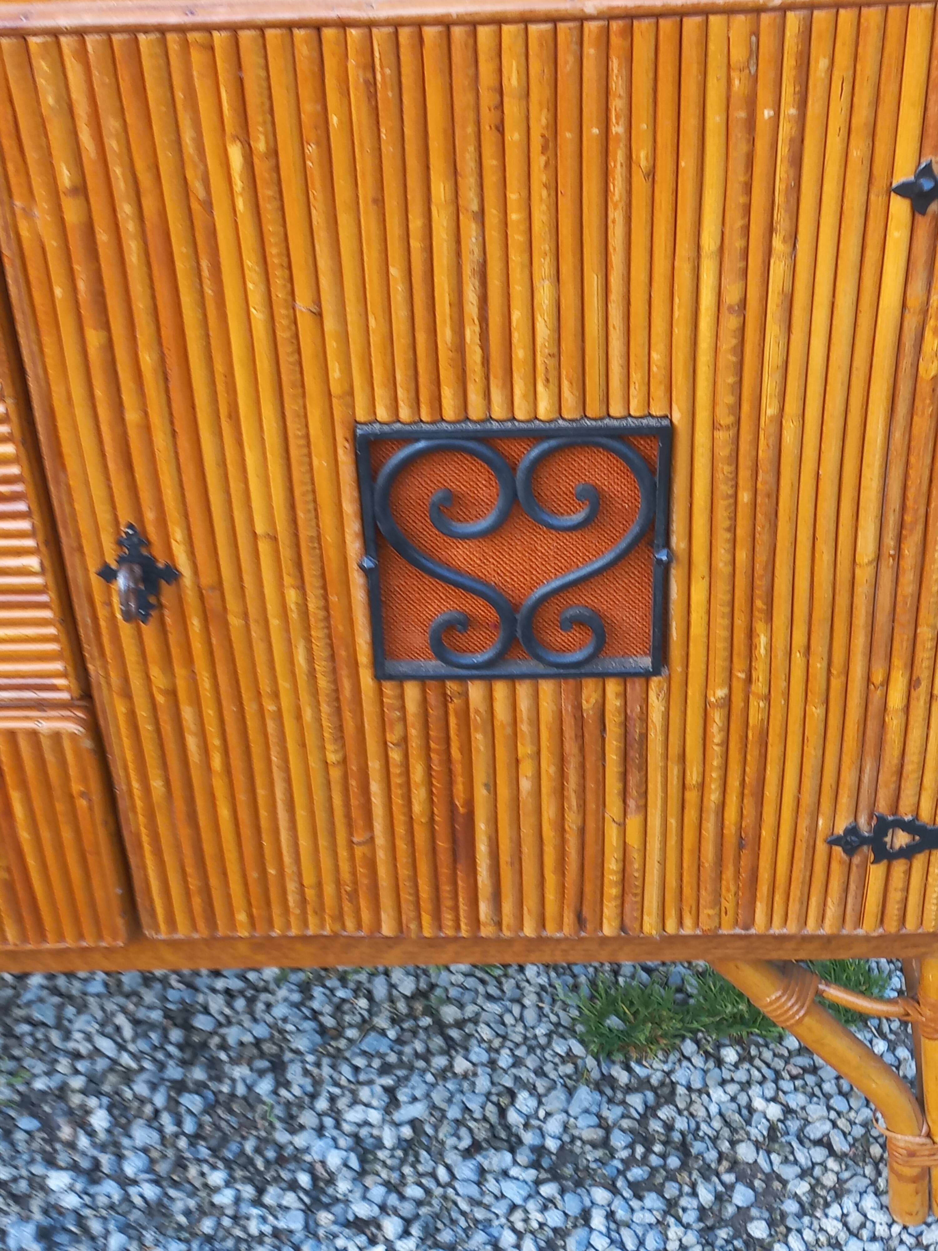 Bamboo and rattan enfilade attributed to Audoux and Minet.