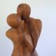 Le baiser sculpture en bois