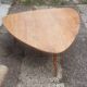 Scandinavian style coffee table with 3 legs