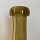 Amber colored Biot bubble glass bottle