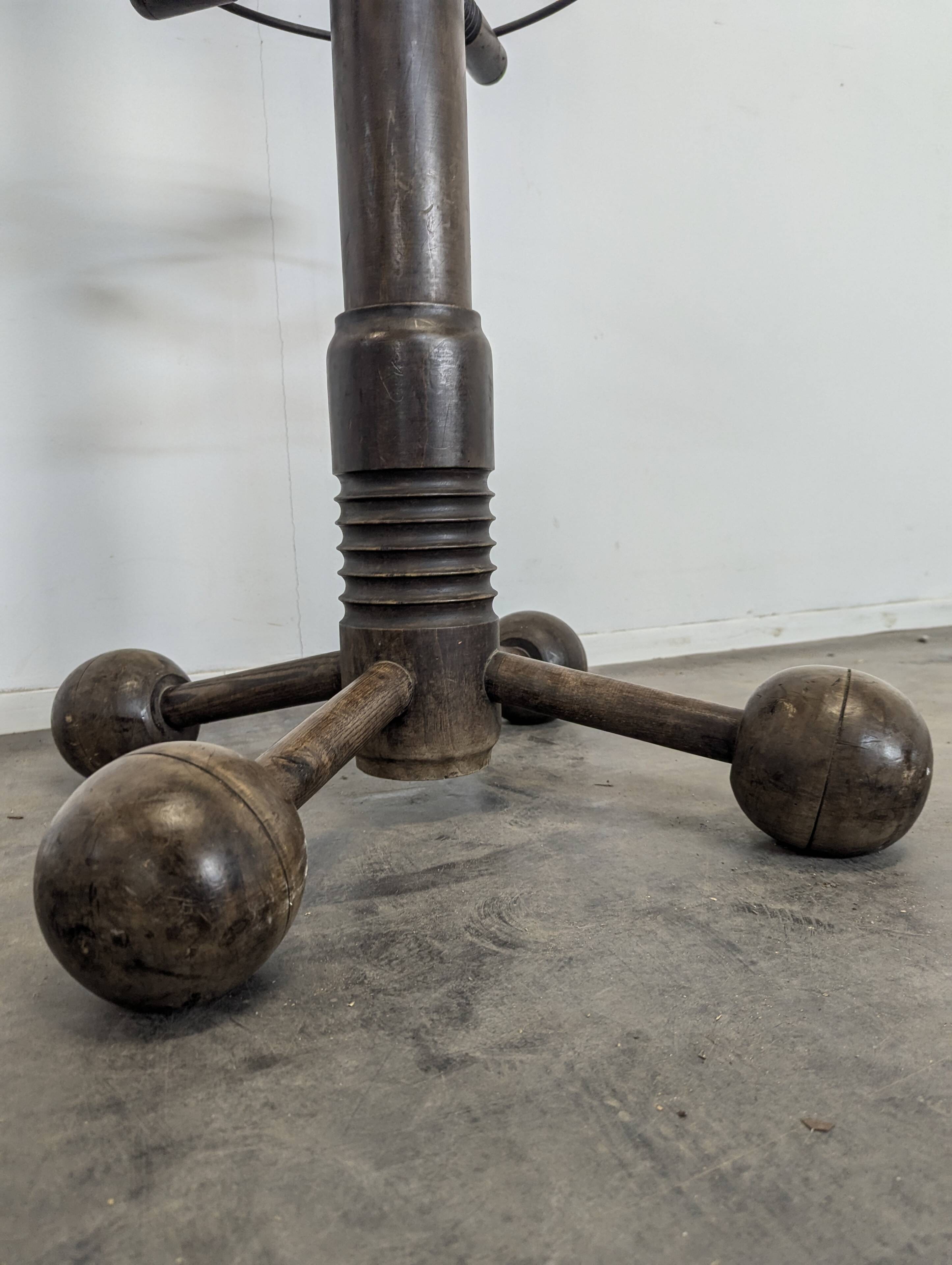 Coat rack by Charles Dudouyt in solid oak.