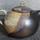 Vintage enameled stoneware potter's teapot
