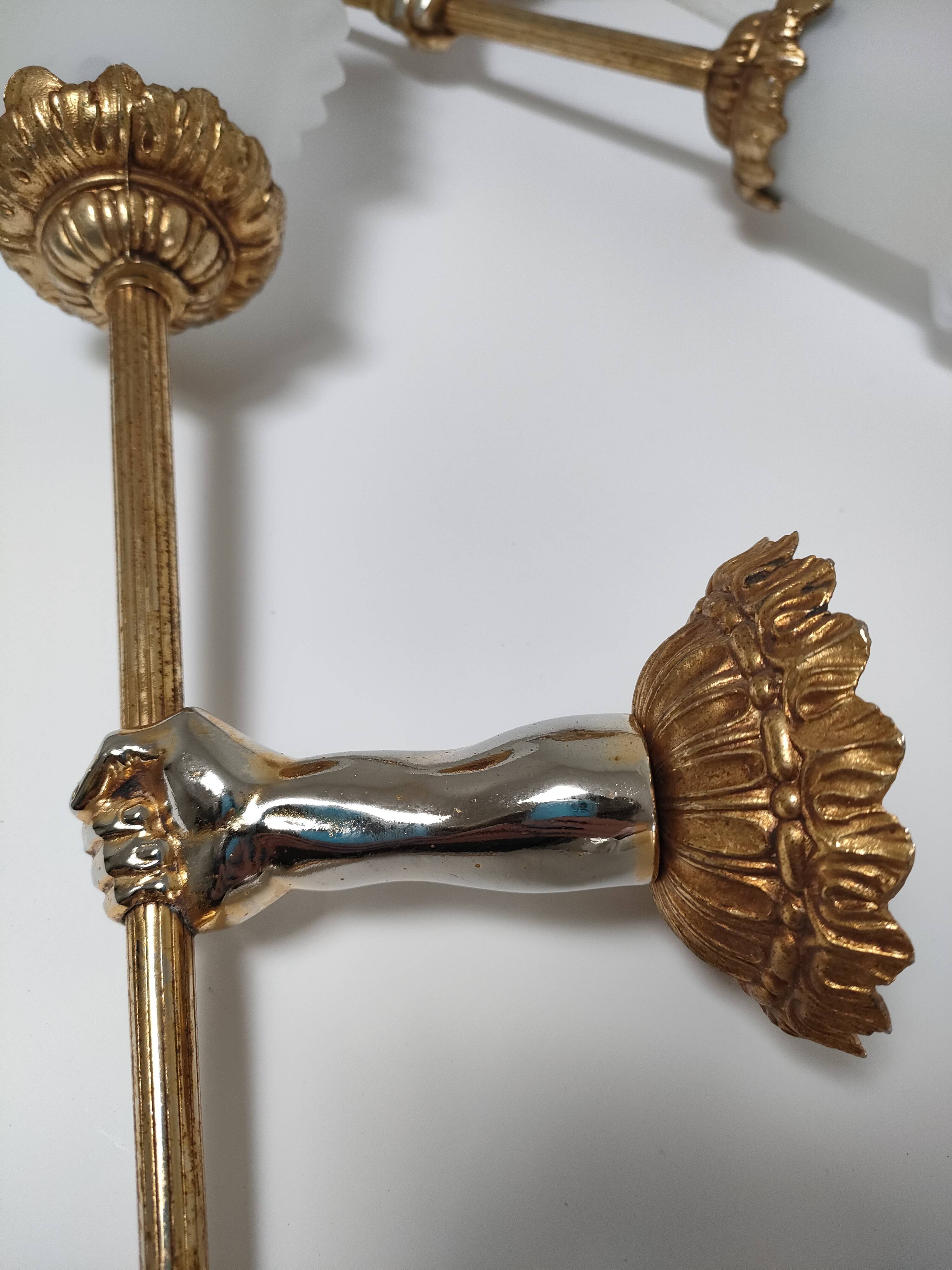 Pair of vintage patinated golden metal hand sconces