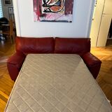 Ensemble canapé cuir convertible et repose-pied Natuzzi