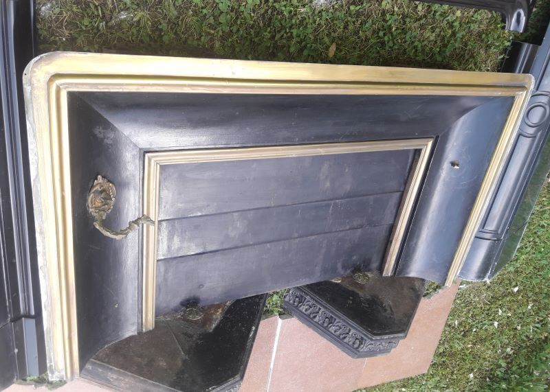 Fireplace XVIII° black marble louis XIV style with narrowed and floor slabs