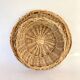 Straw dish on pedestal