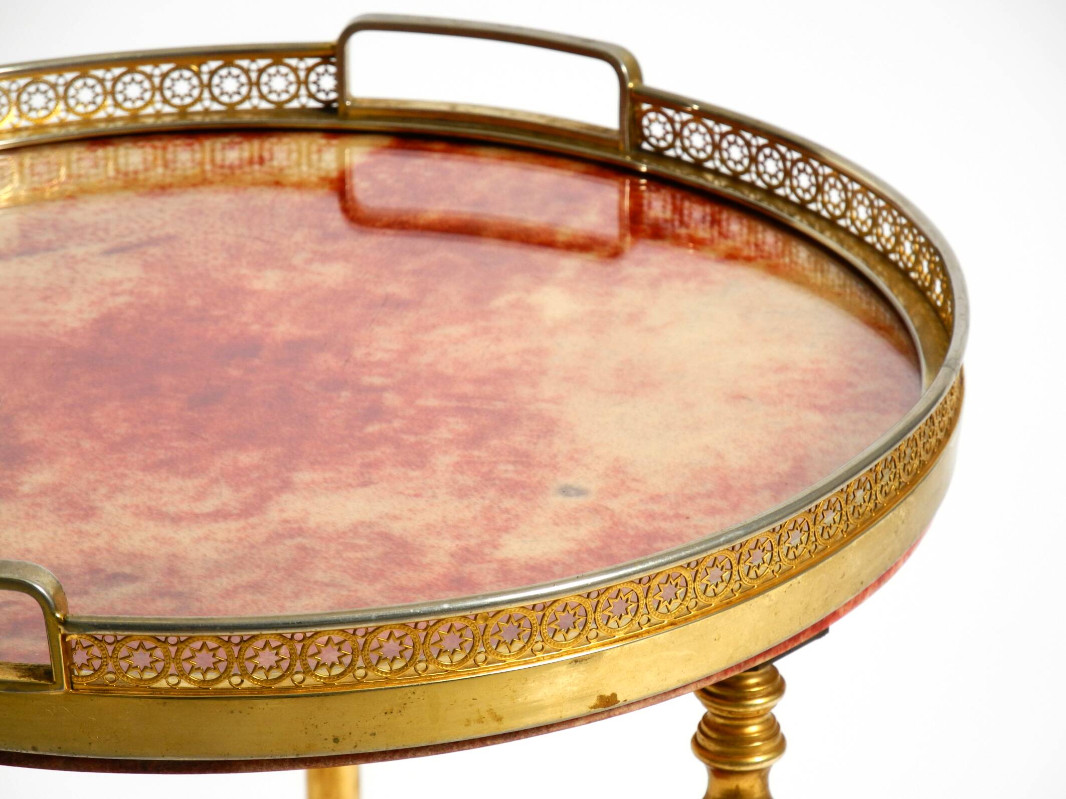 Round, small 1960s Aldo Tura serving or bar trolley in red goatskin leather