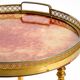Round, small 1960s Aldo Tura serving or bar trolley in red goatskin leather