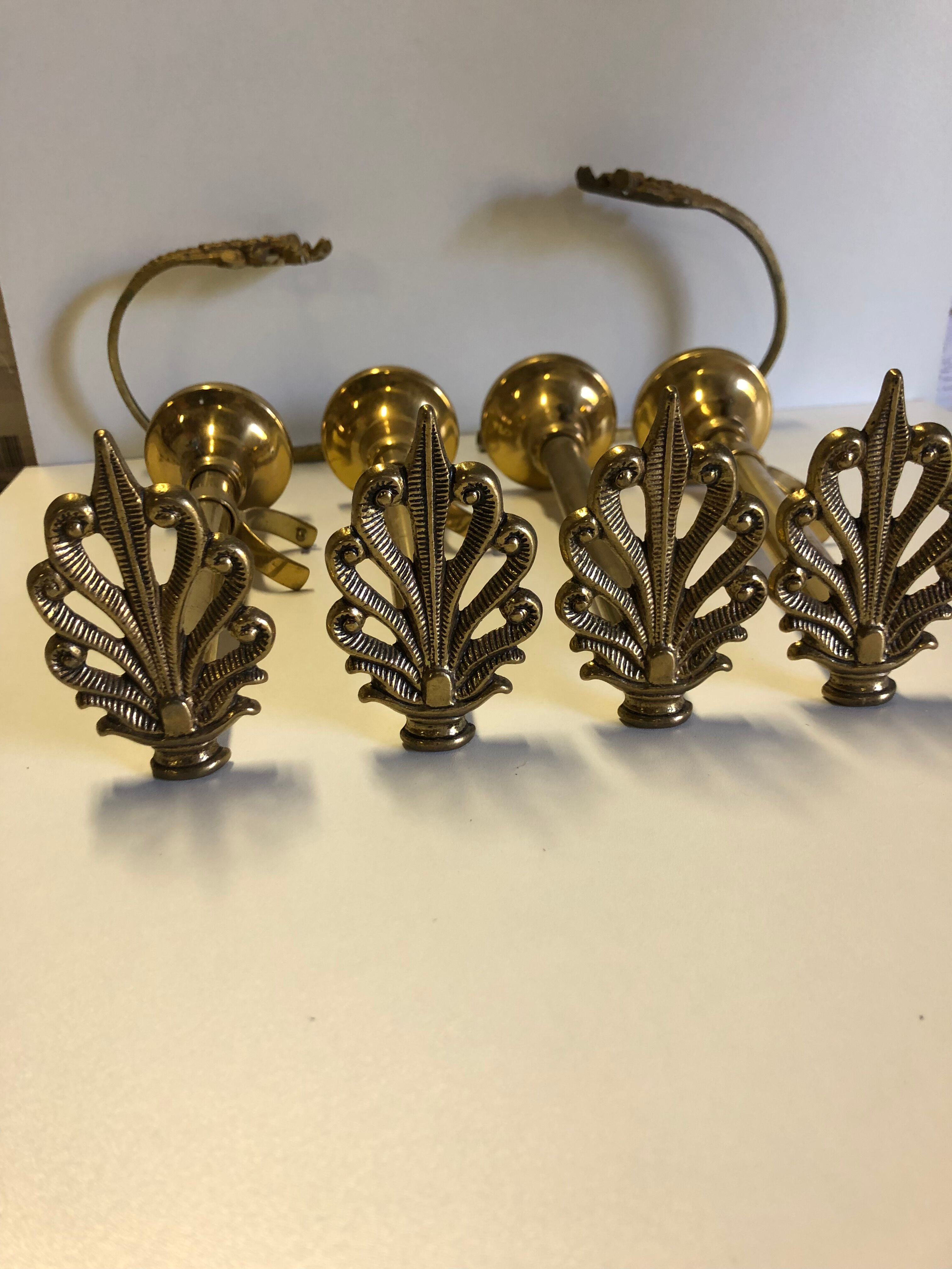 Supports curtain rods and ambers